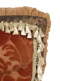 A Set of Three Velvet Upholstered Pillows with Tassels