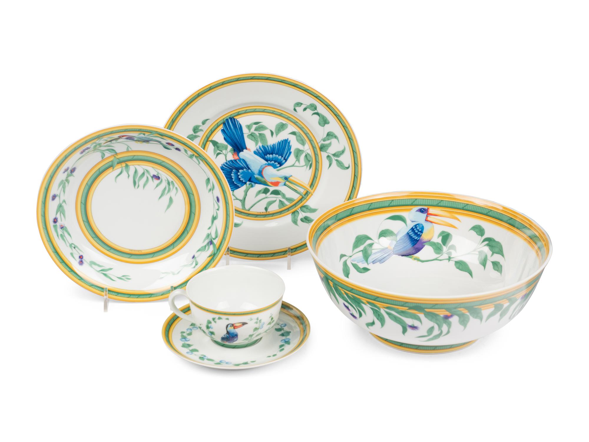 An Hermès Toucans Porcelain Dinner Service