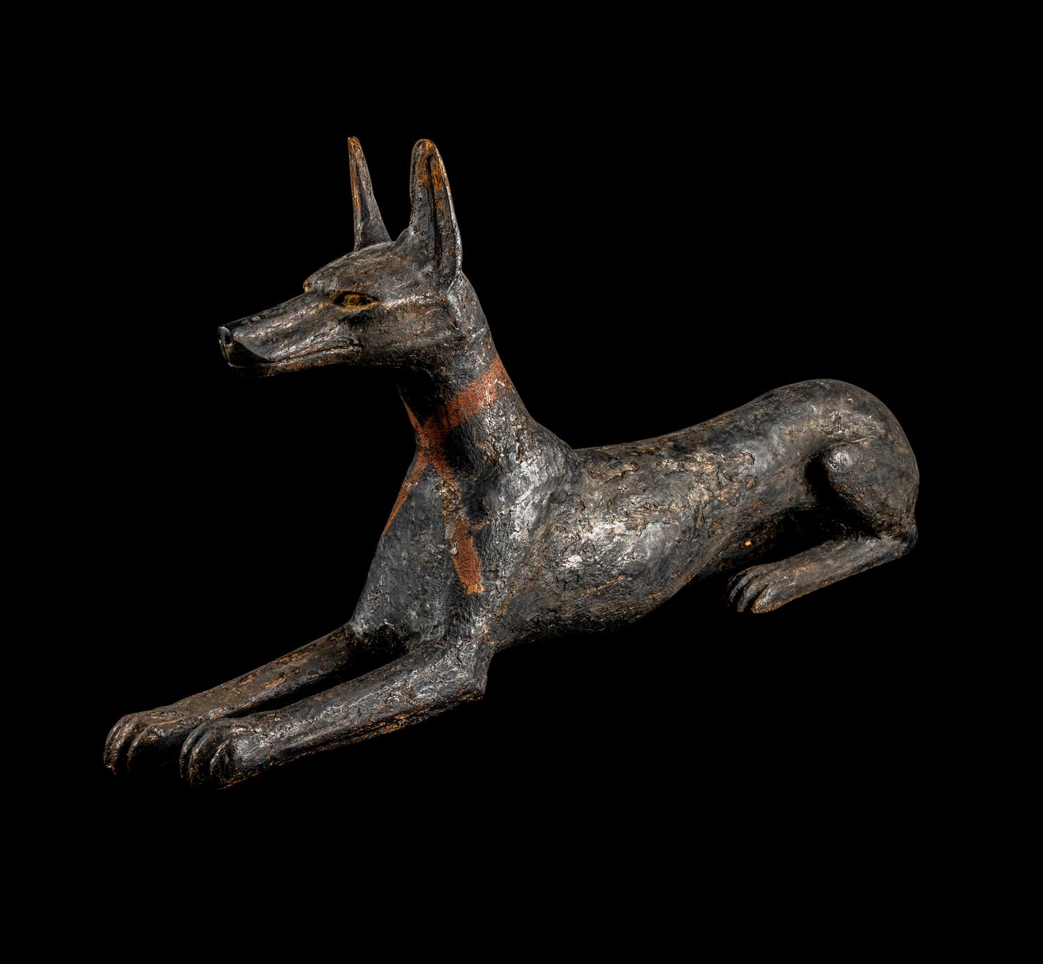 An Egyptian Painted Wood Anubis