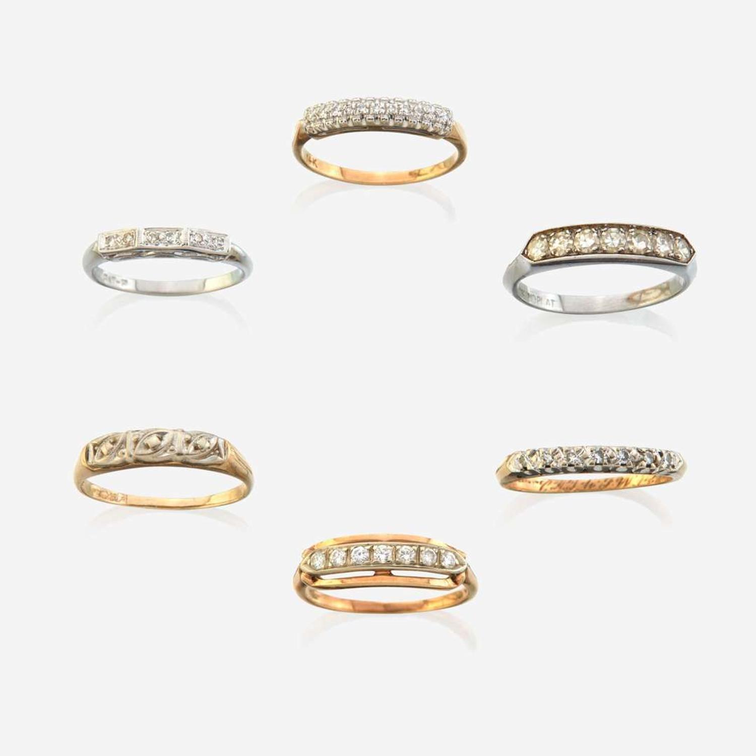 A collection of six gem-set rings