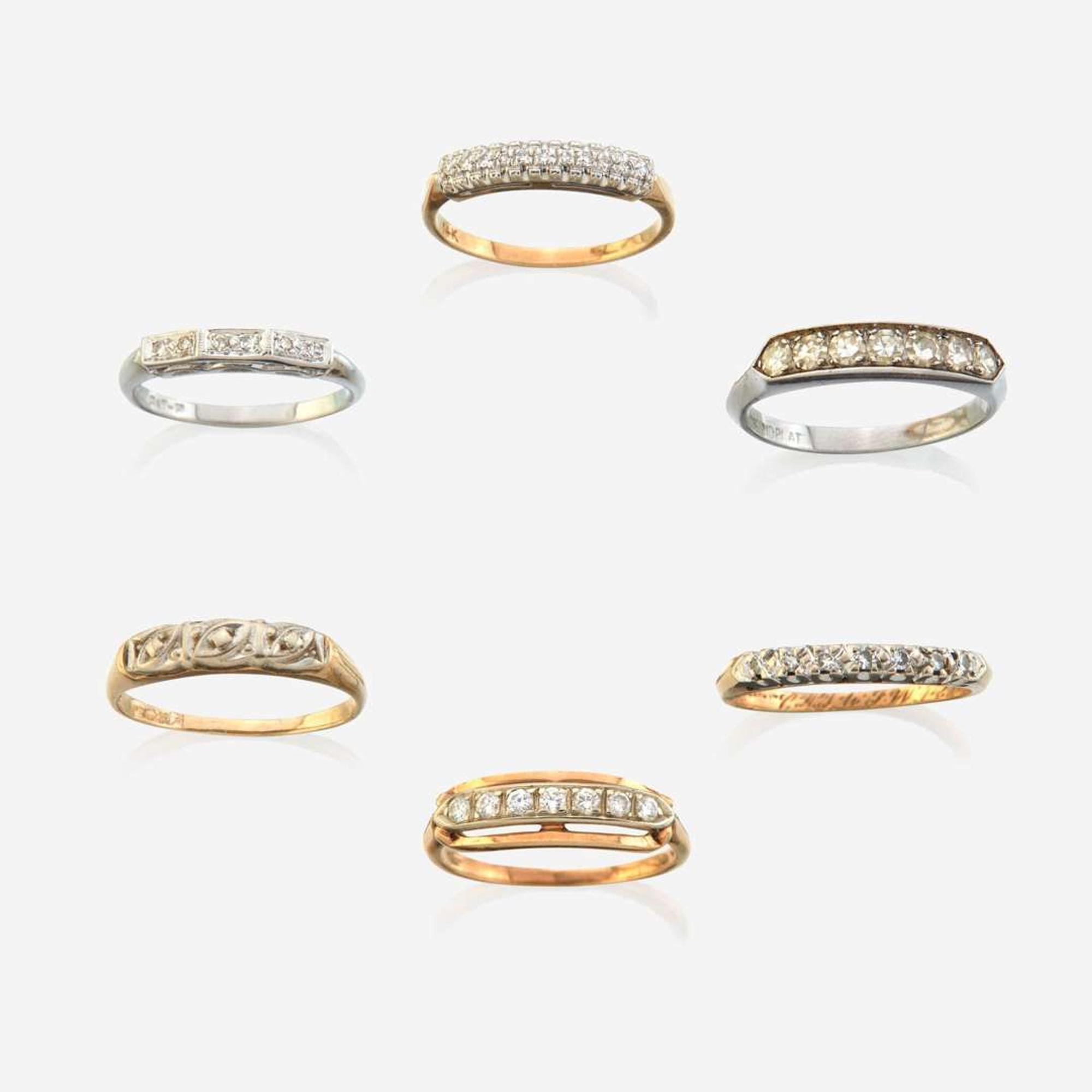 A collection of six gem-set rings