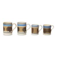 A Group of Four Mochaware Mugs with "Seaweed Decoration"