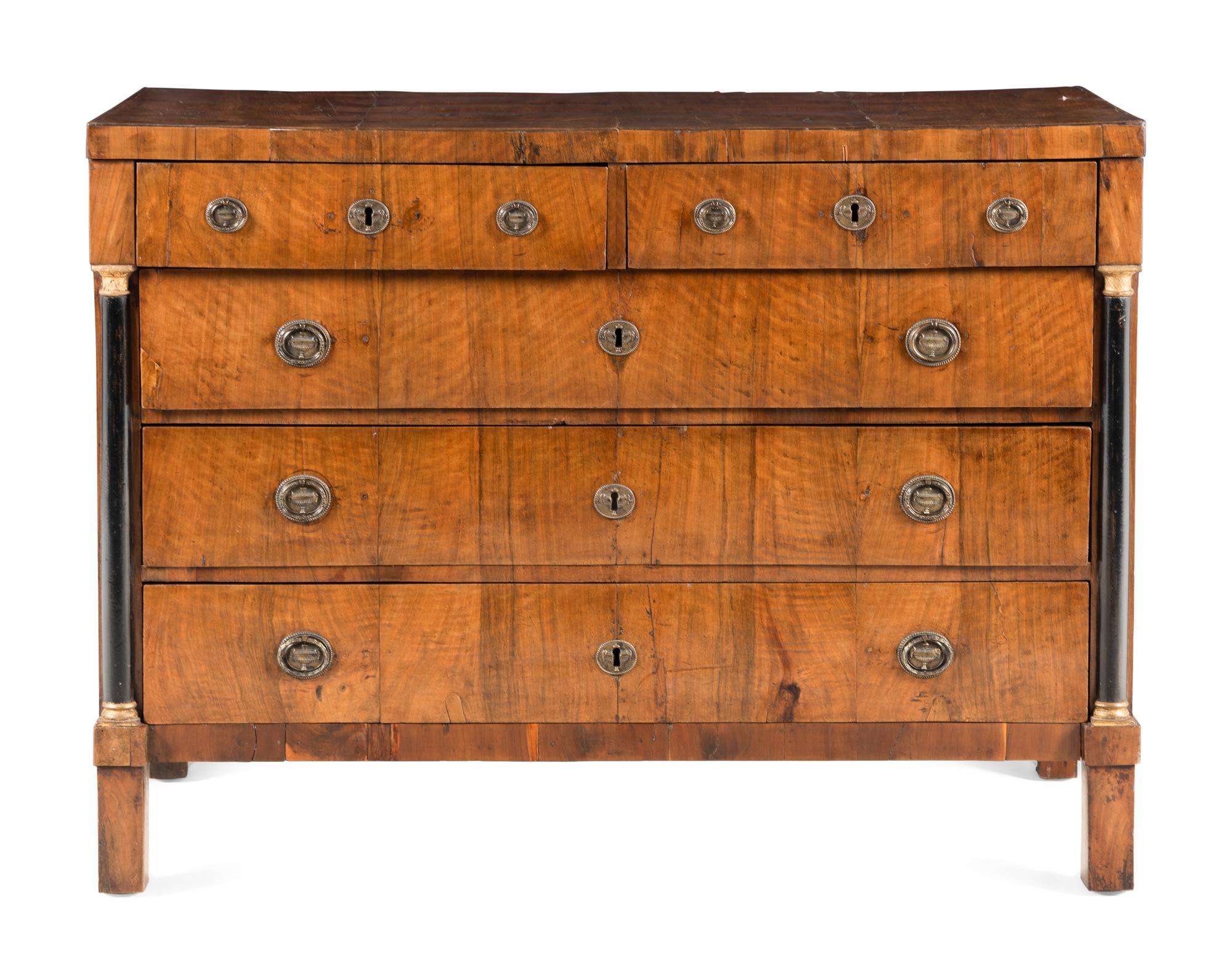 An Empire Walnut and Parcel Ebonized Commode