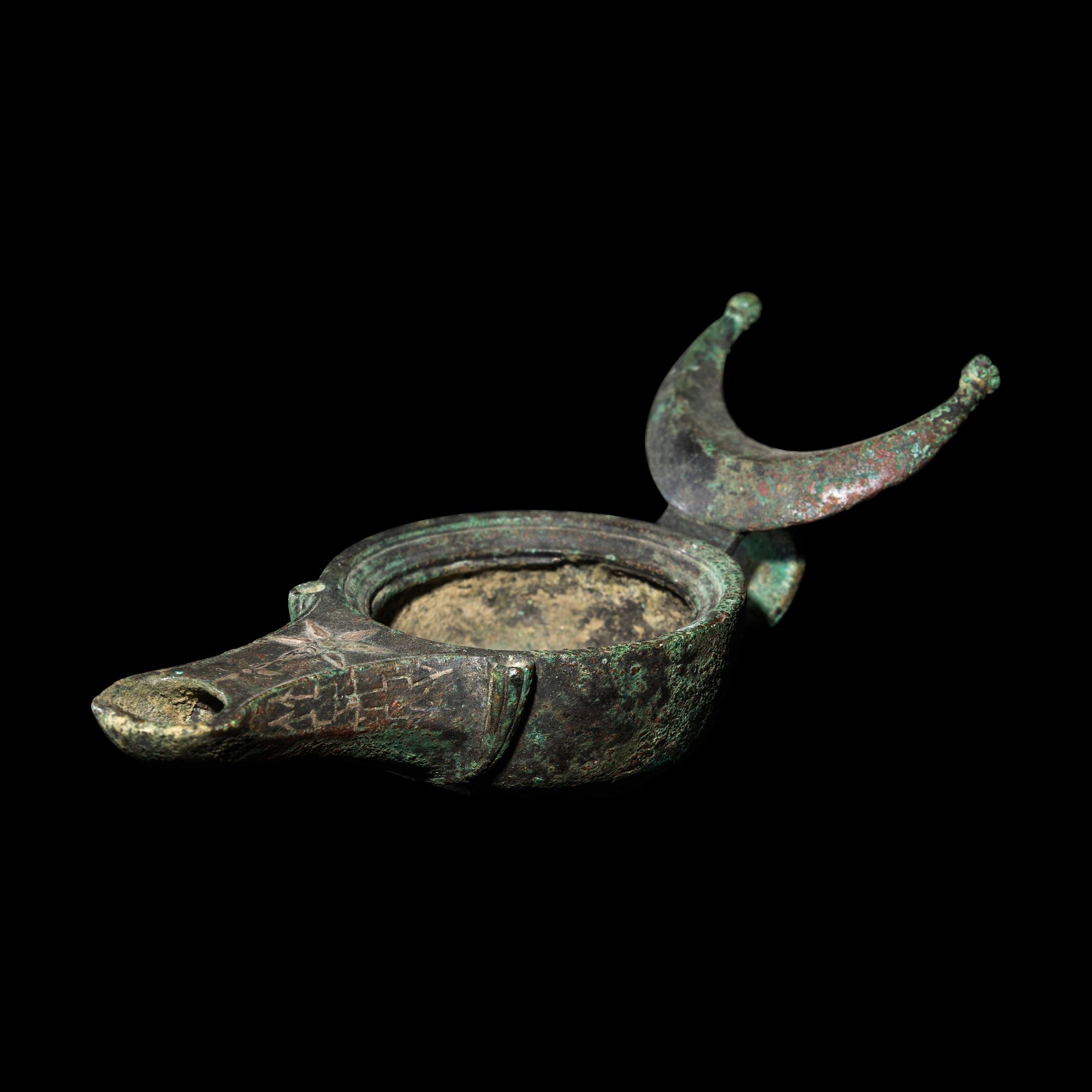 A Roman Bronze Oil Lamp