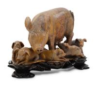 A Chinese Carved Soapstone Figure of Pig and Piglets
