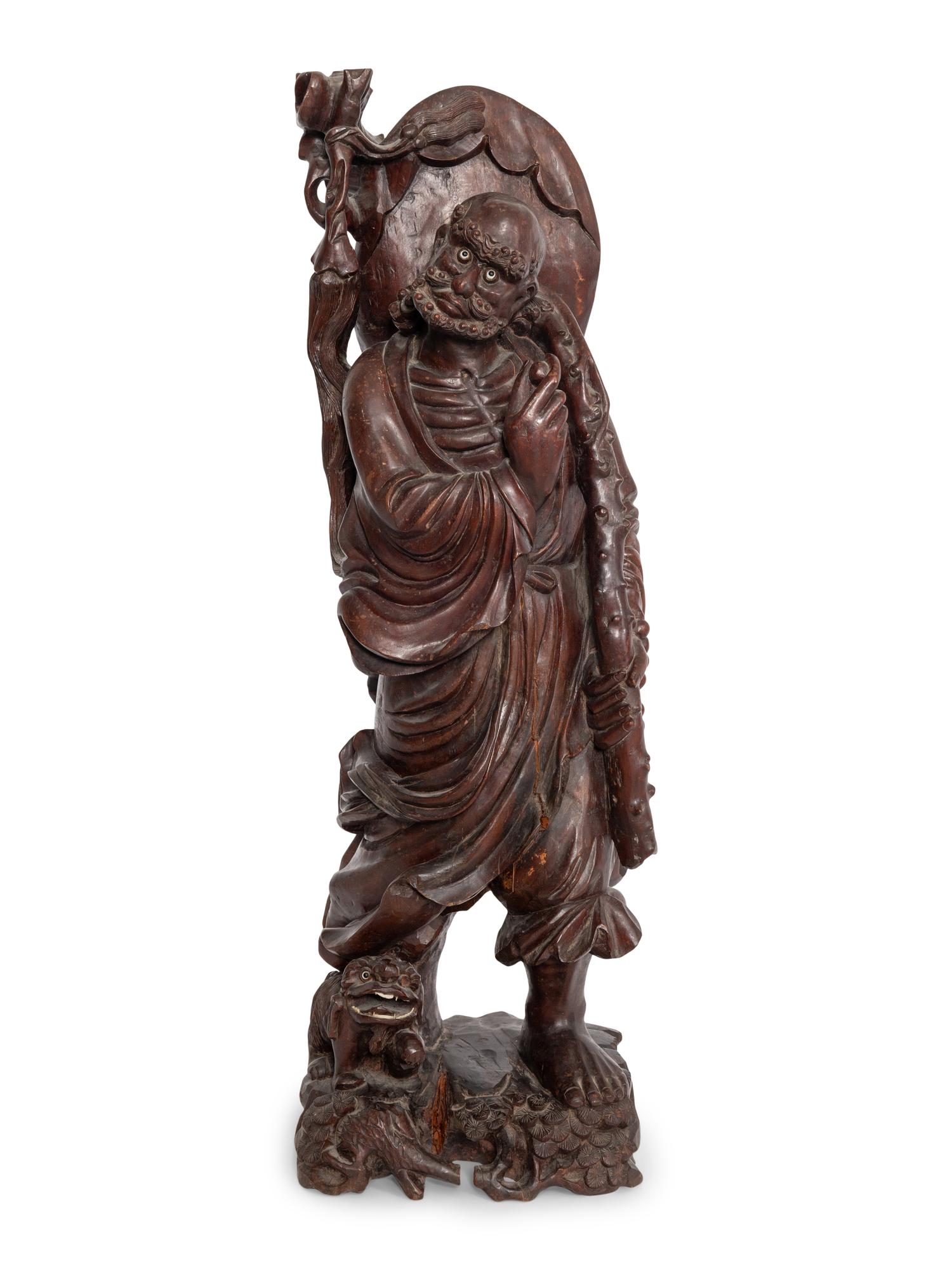 A Large Chinese Daruma Carving