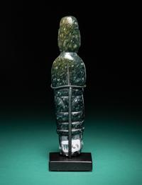 An Olmec Jade Pounding Figure