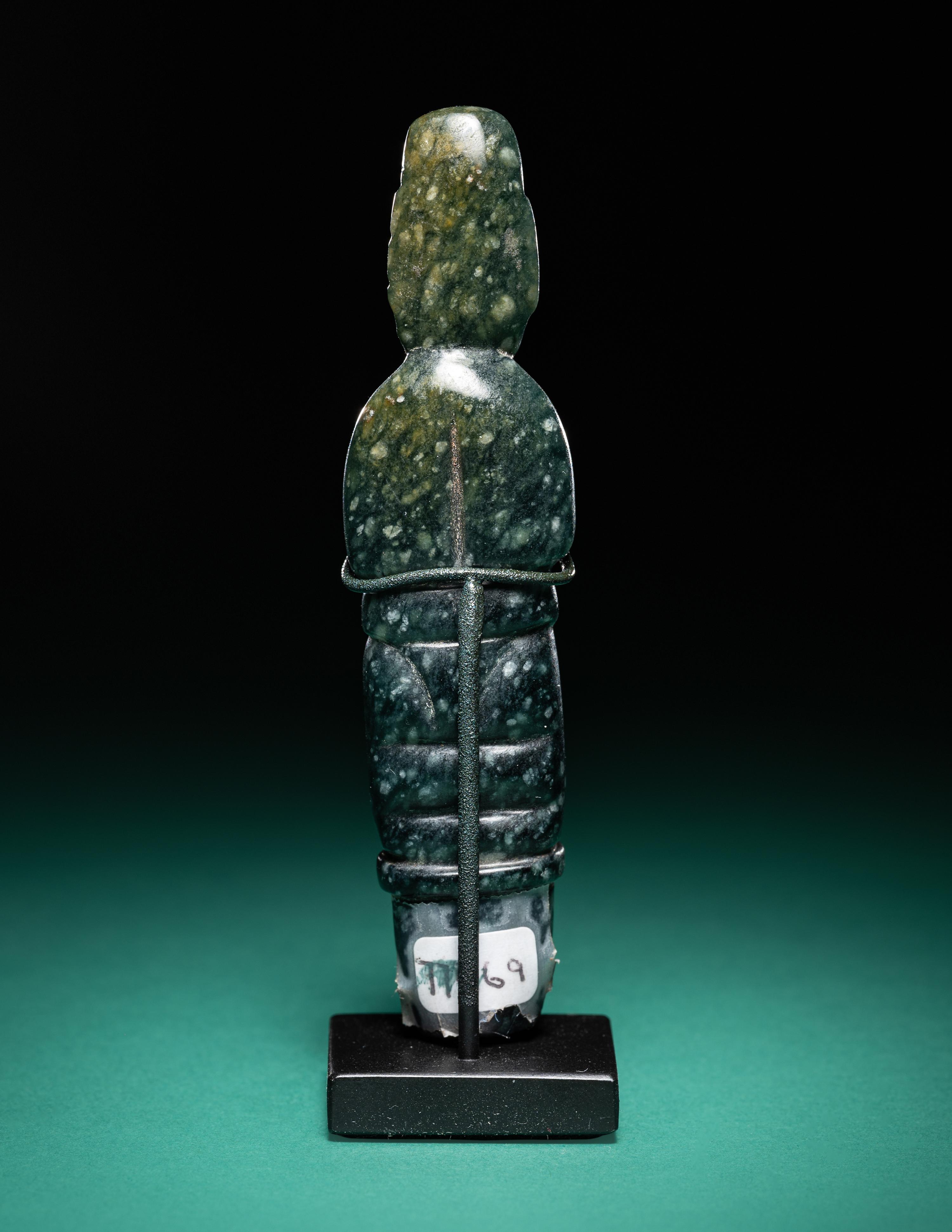 An Olmec Jade Pounding Figure