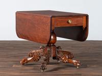 A Classical Highly Carved Cherrywood Drop-Leaf Dining Table