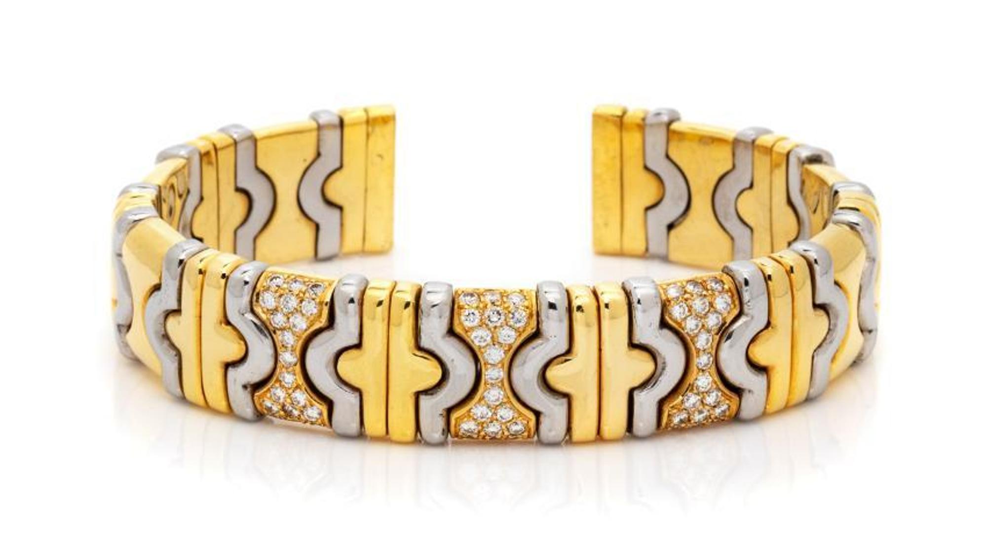 DINO CEVA, YELLOW GOLD, STEEL AND DIAMOND CUFF BRACELET