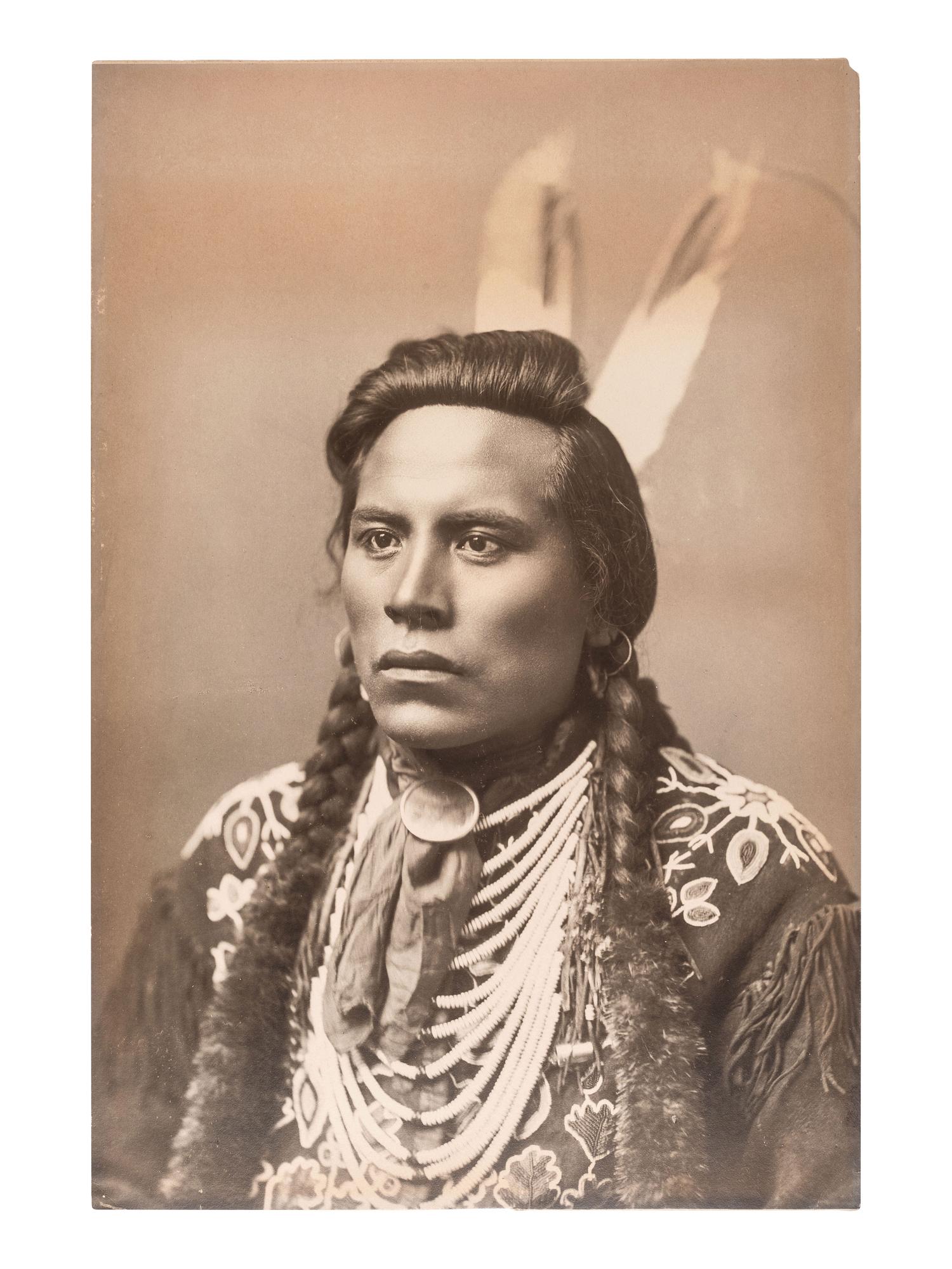 [NATIVE AMERICANS]. [HAYNES, F. Jay (1853-1921), photographer]. Large format albumen photograph of Ashishishe, or Curley. Dakota Territory, 1883.