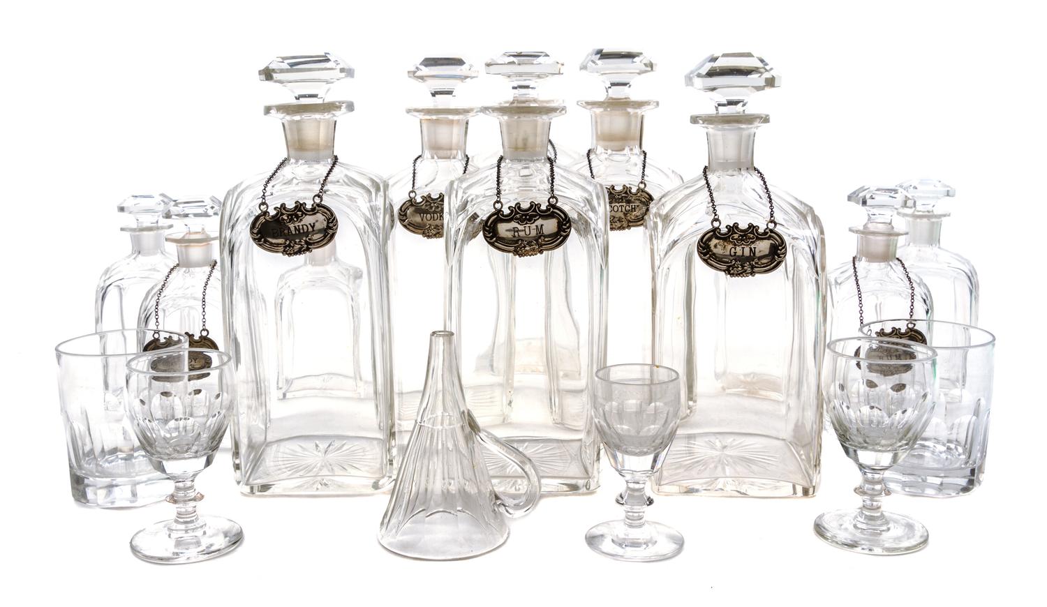 A George III Style Brass Banded Mahogany Campaign Decanter Set Width of cast 16 1/2 inches. — 19TH CENTURY