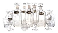 A George III Style Brass Banded Mahogany Campaign Decanter Set Width of cast 16 1/2 inches. — 19TH CENTURY