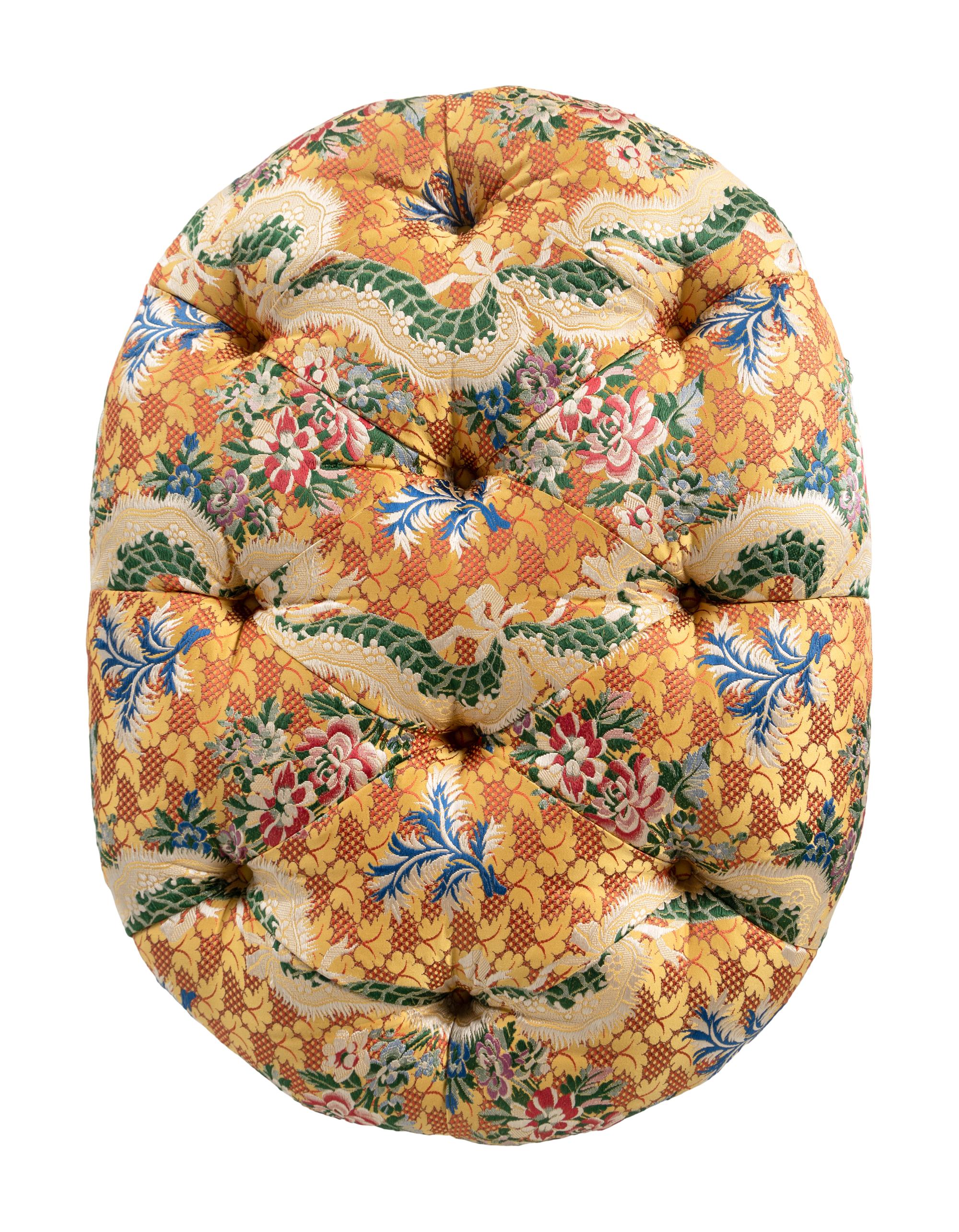 A Button-Tufted Ottoman with Jacquard Upholstery