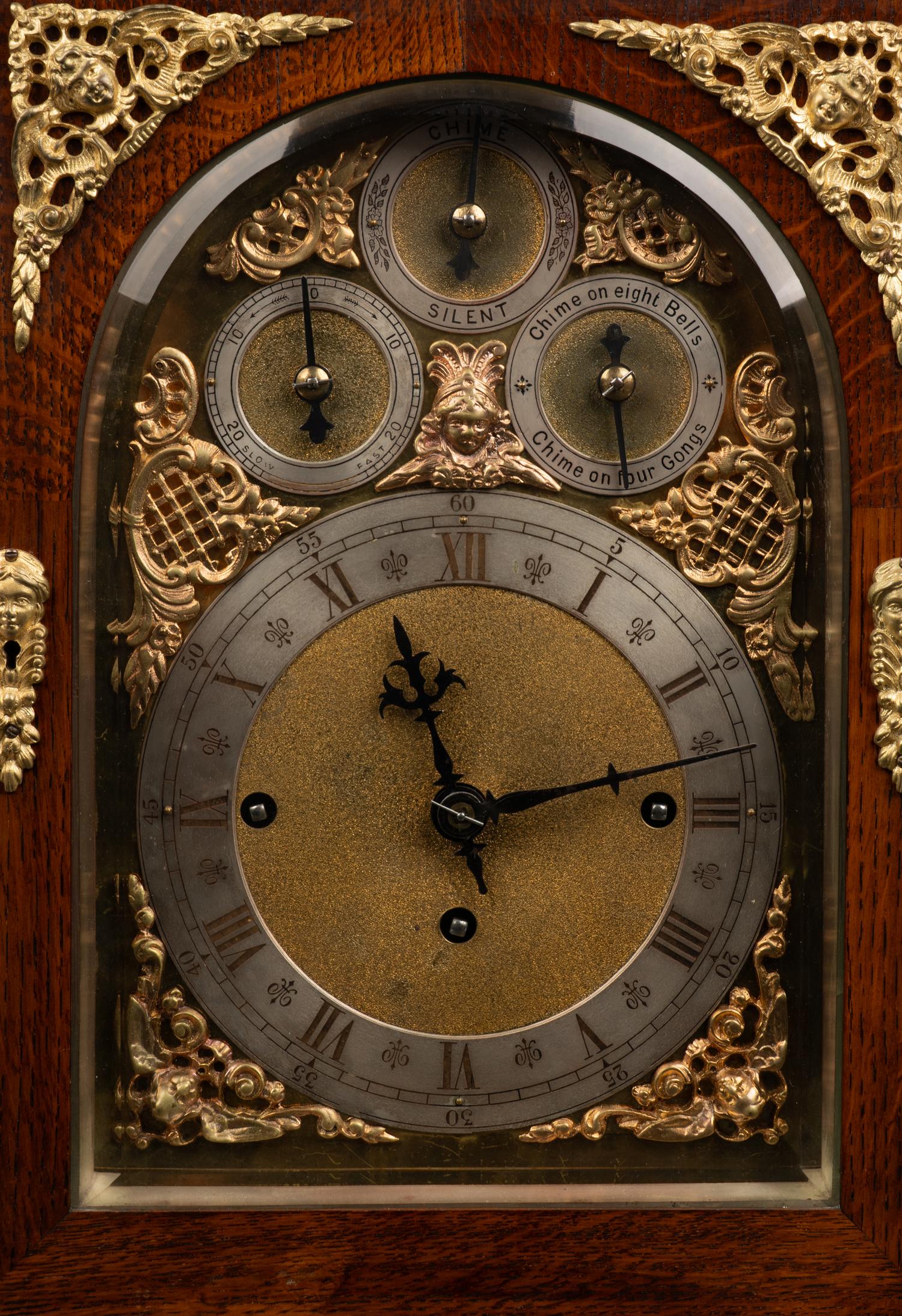 A George II Style Gilt Bronze Mounted Oak Bracket Clock