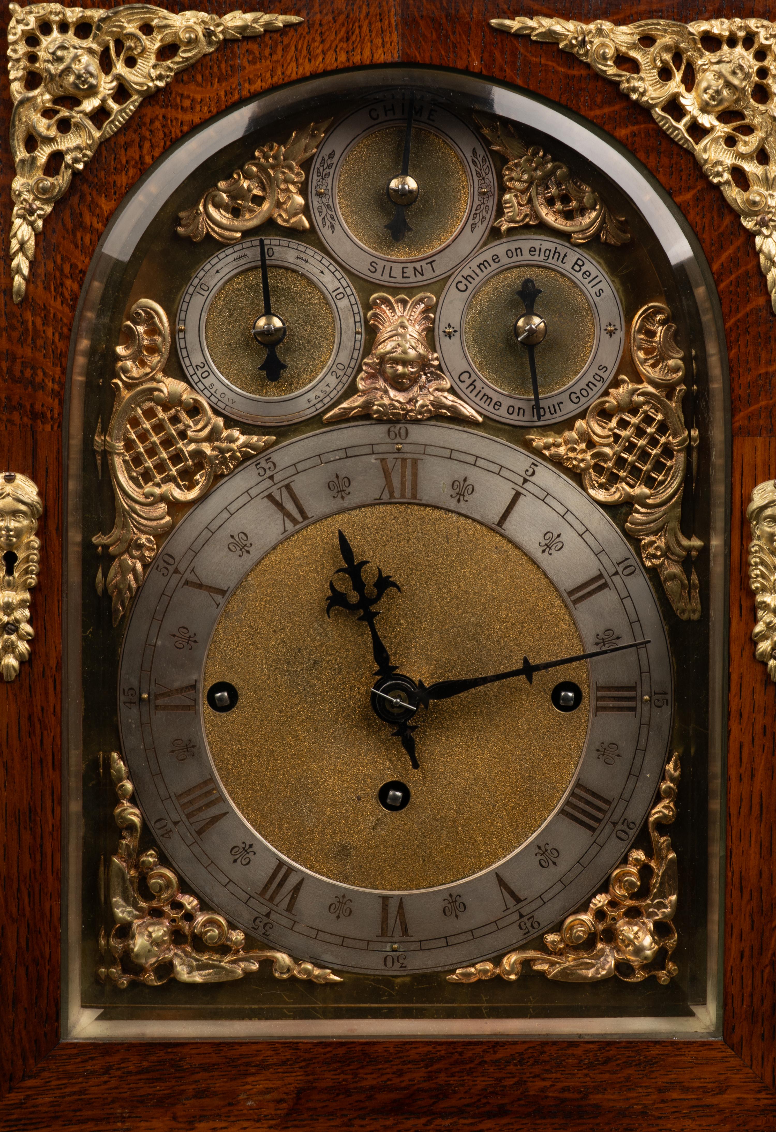 A George II Style Gilt Bronze Mounted Oak Bracket Clock