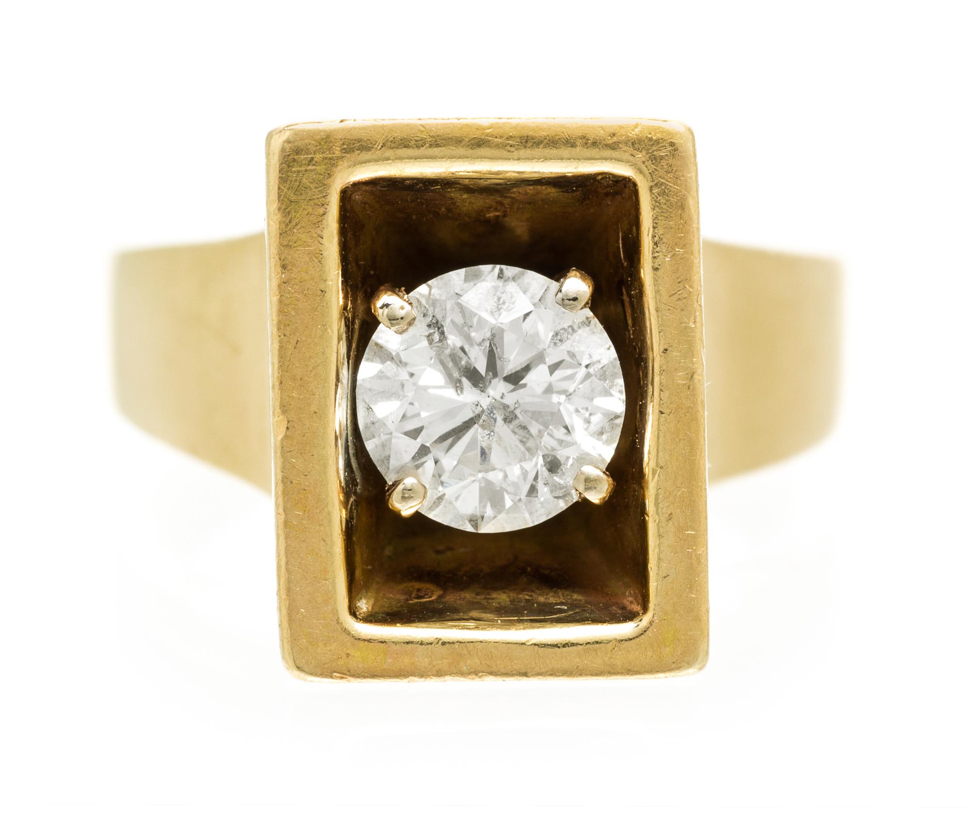 A 14 Karat Yellow Gold and Diamond Ring, 11.10 dwts.