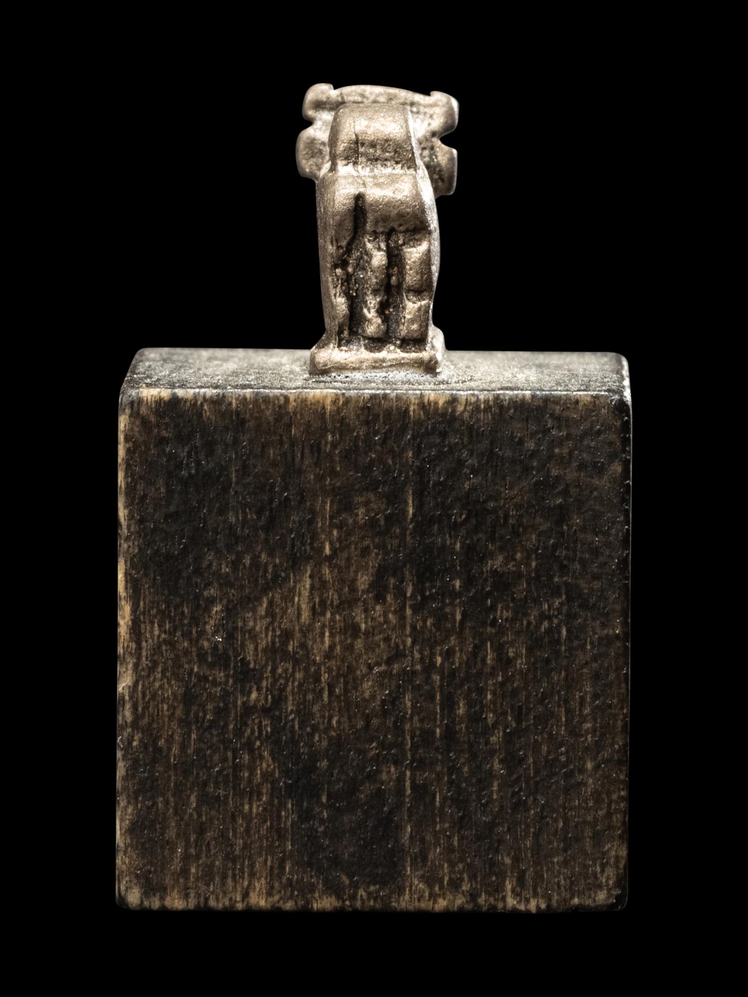 An Egyptian Silver Apis Amulet
