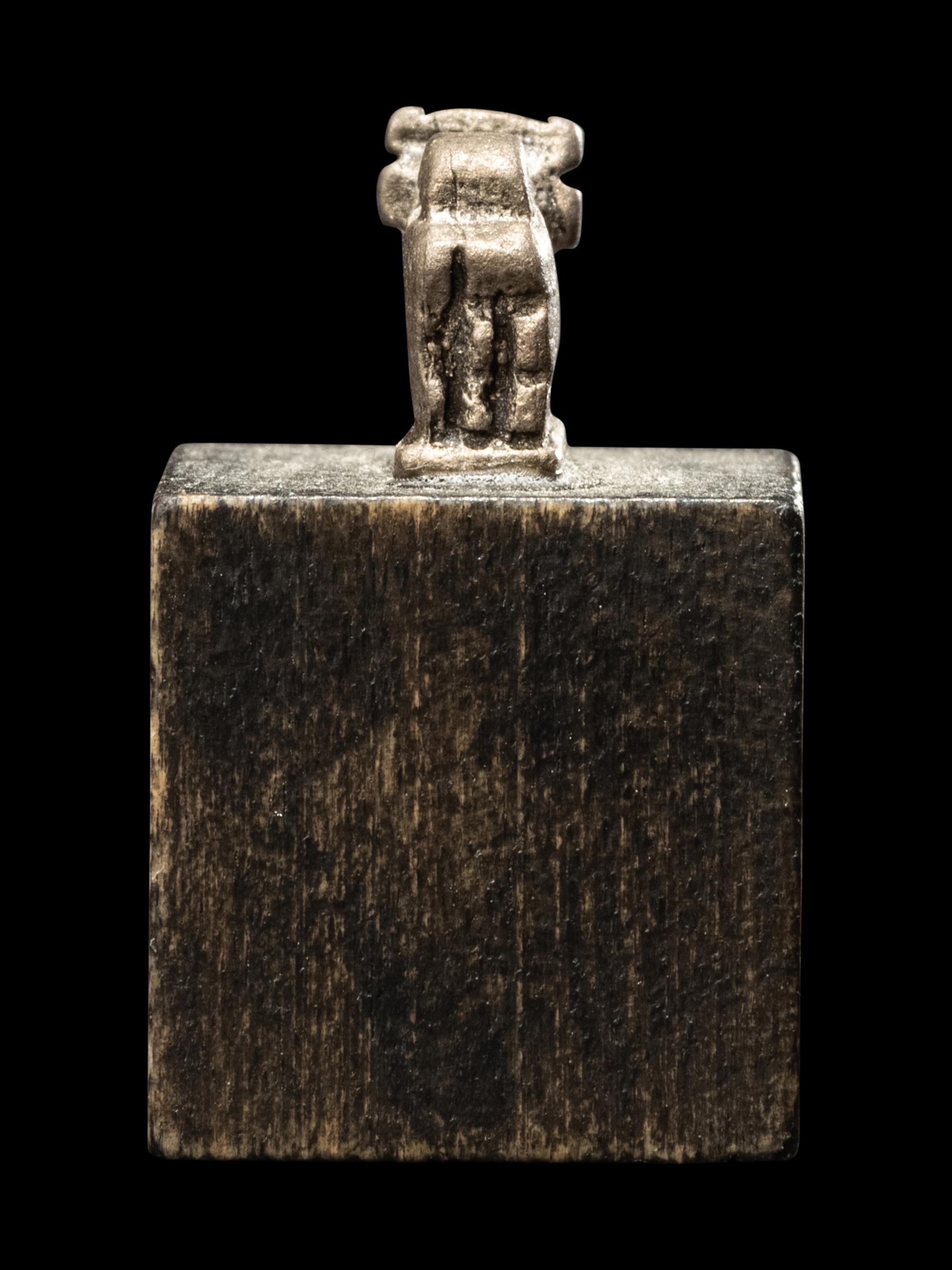 An Egyptian Silver Apis Amulet