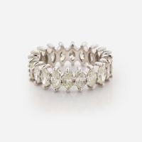 A Diamond and 18K White Gold Eternity Band