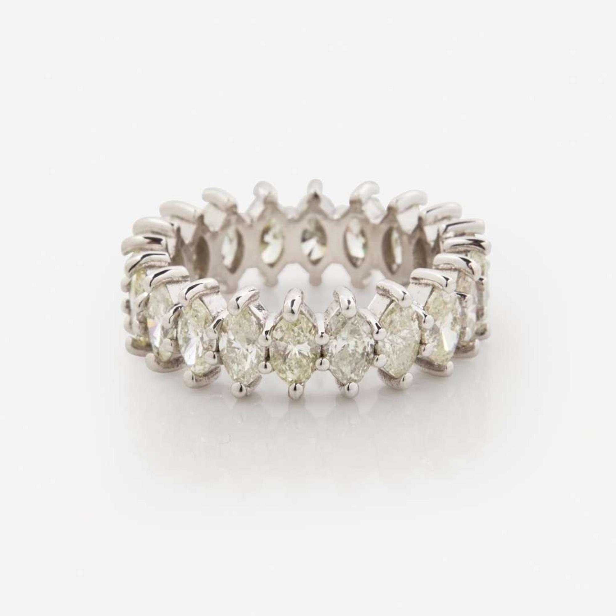 A Diamond and 18K White Gold Eternity Band