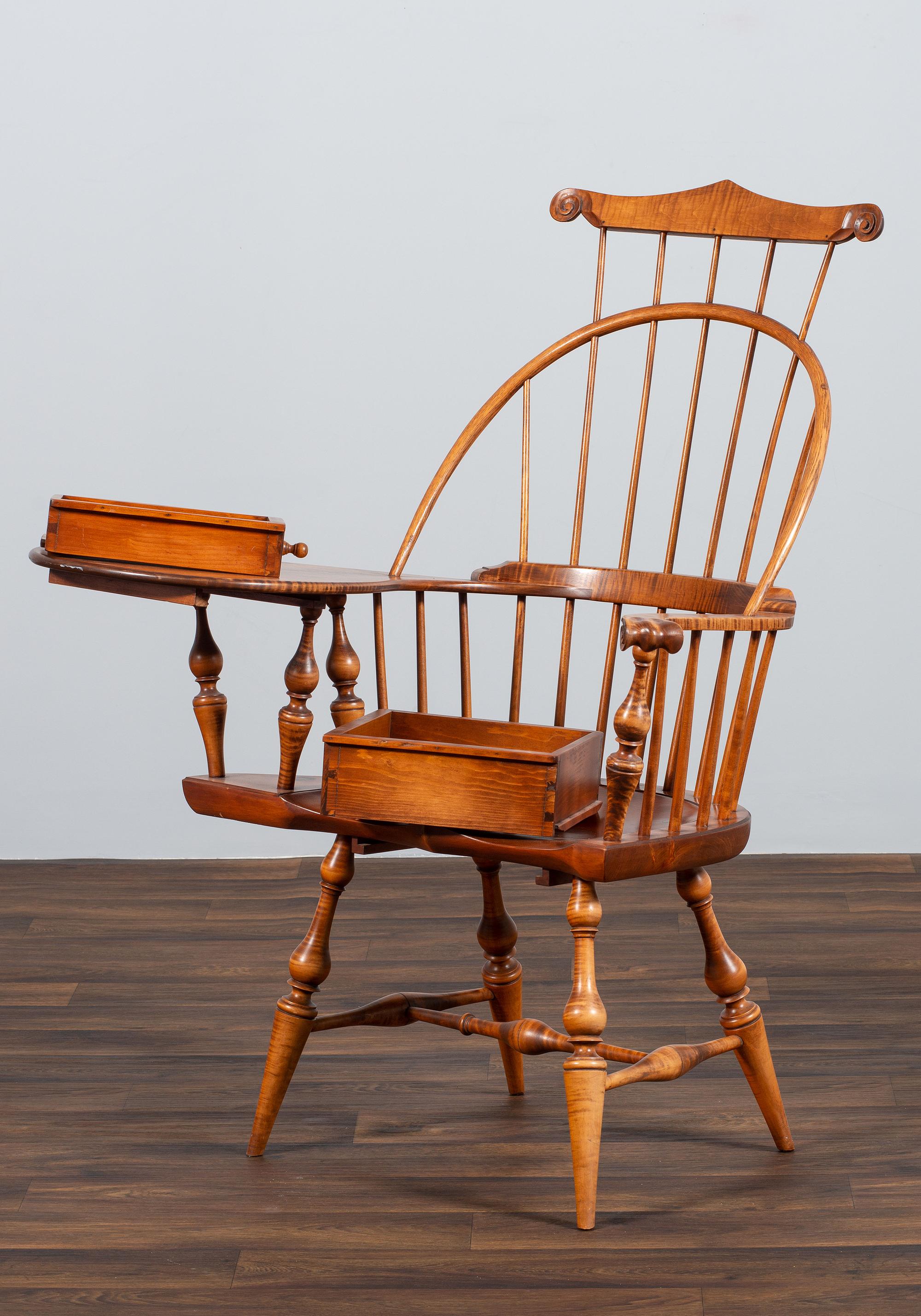 A D.R. Dimes Turned and Volute Carved Tiger Maple Windsor Three-Back Writing Armchair
