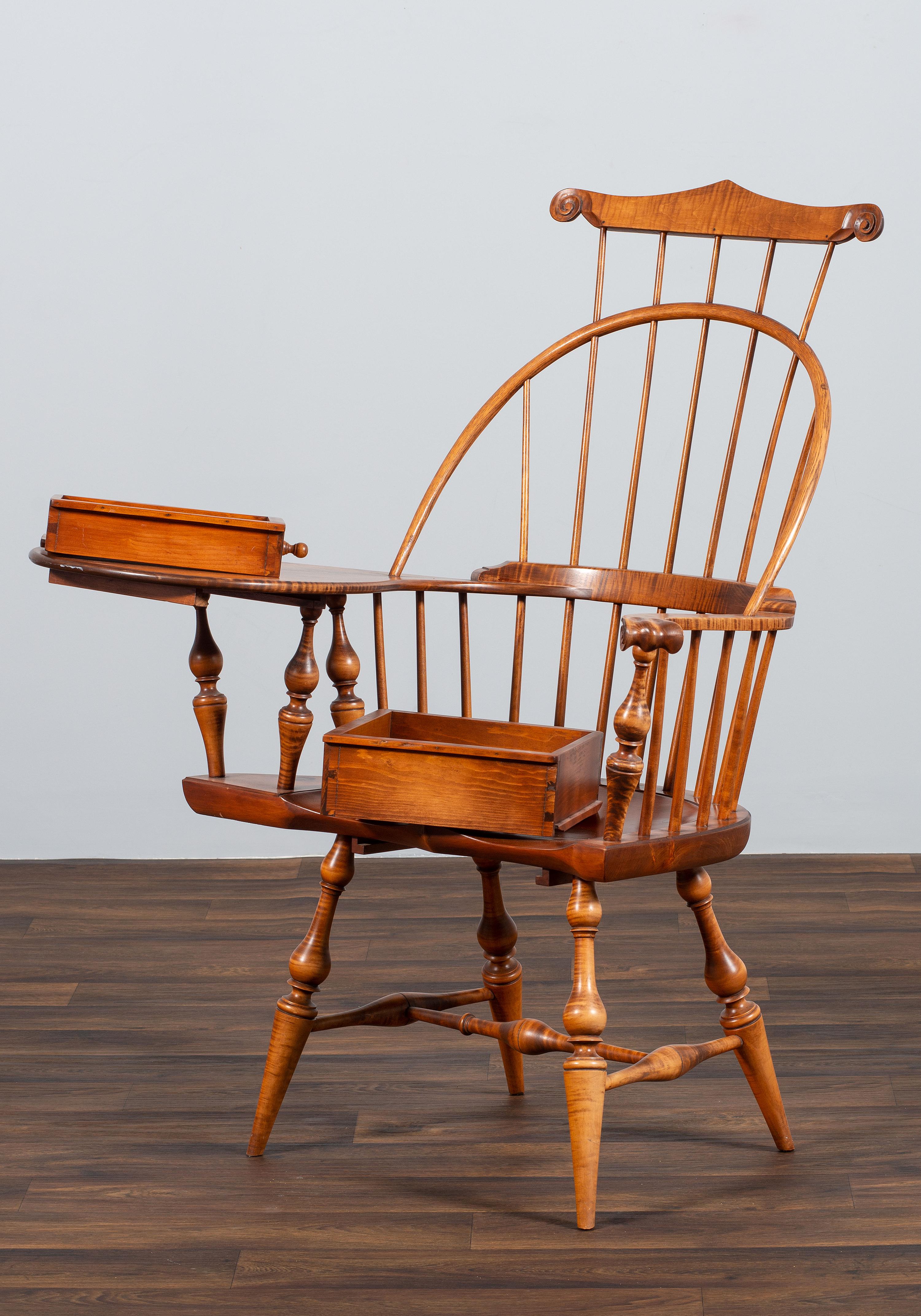 A D.R. Dimes Turned and Volute Carved Tiger Maple Windsor Three-Back Writing Armchair