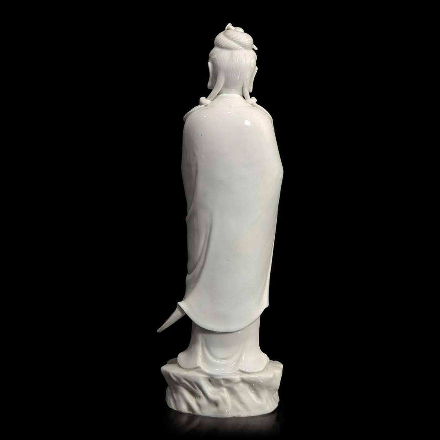 A Chinese blanc de Chine figure of Guanyin 白瓷观音像