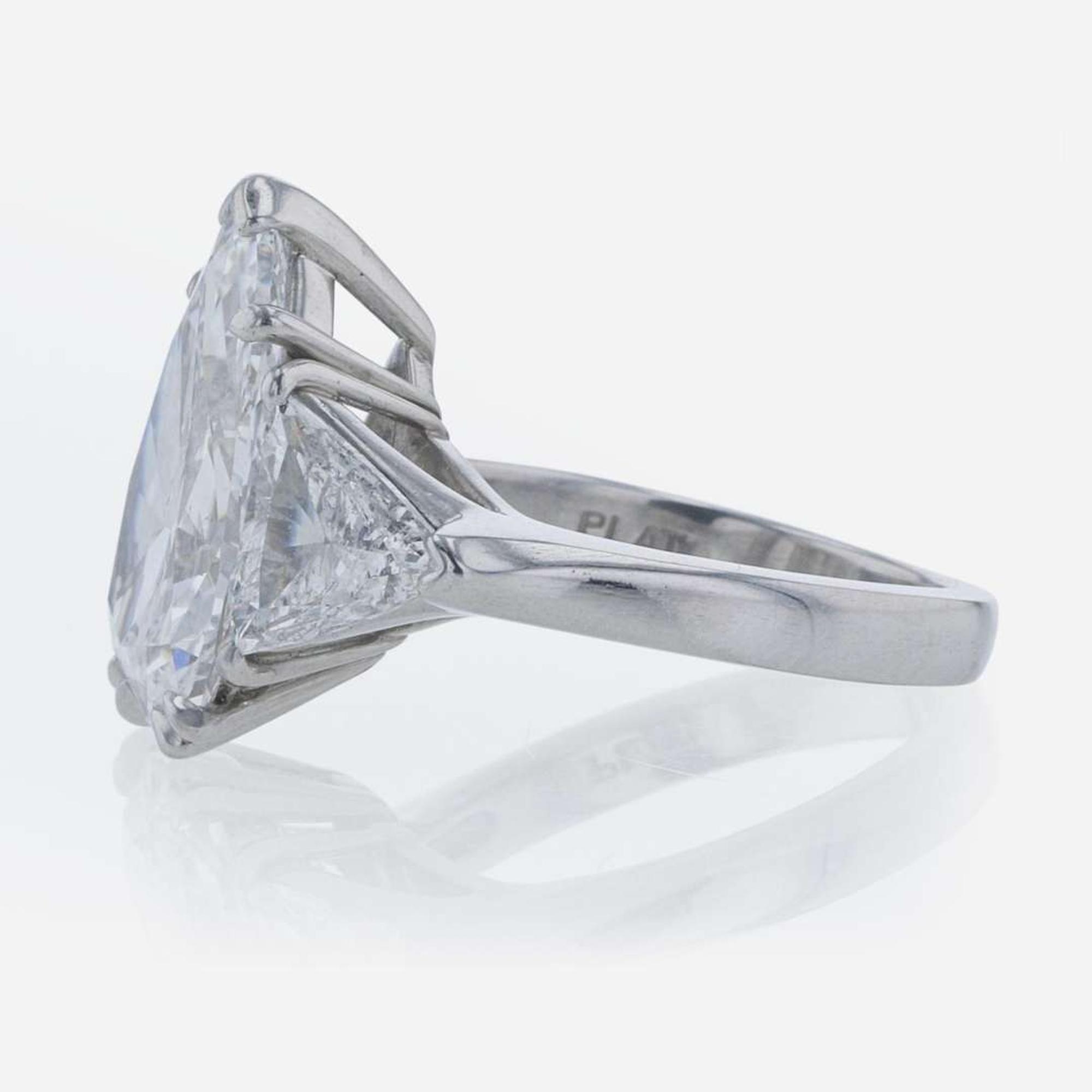 Three-Stone Diamond and Platinum Ring 5.97 Carat Pear-Shape Diamond, GIA Certified