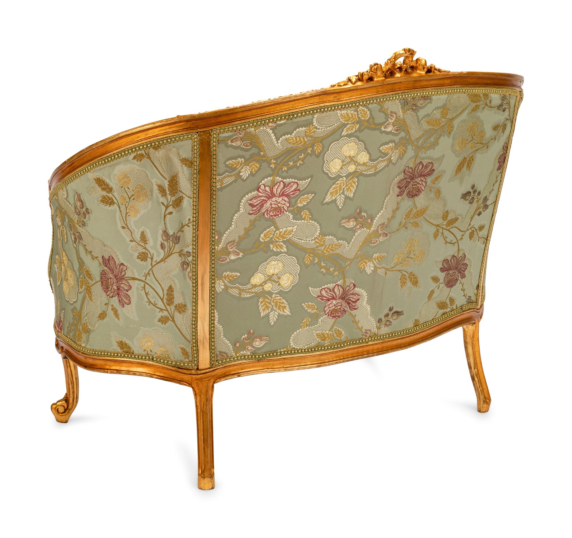 A Pair of Louis XV Style Giltwood Sofas