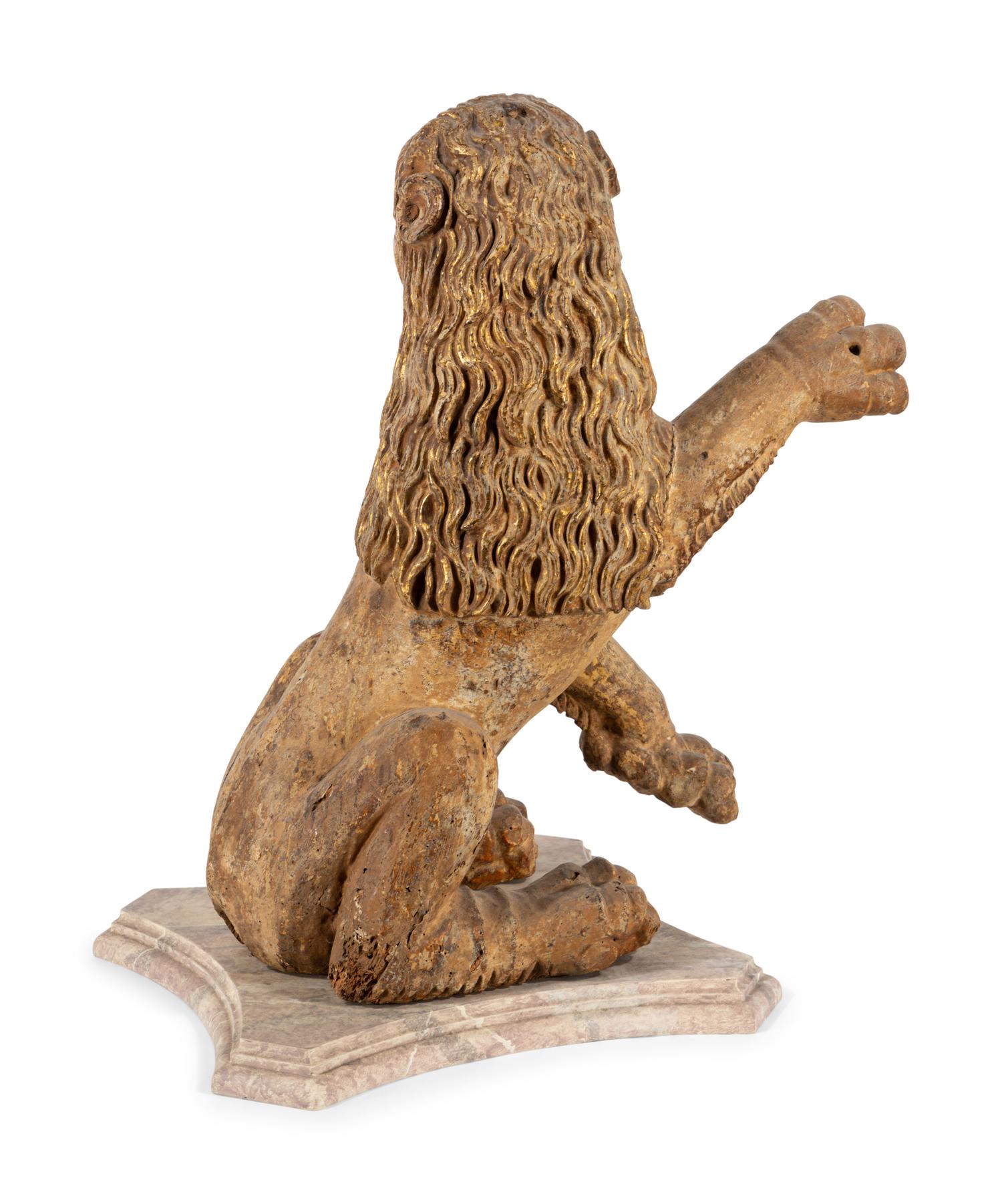 A Spanish Carved Wood and Polychrome Decorated Rampant Lion