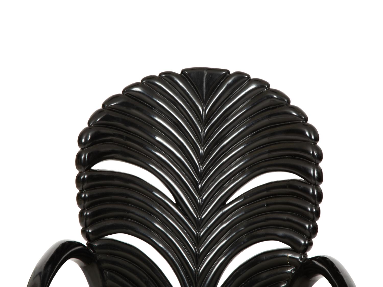 A Venetian Grotto Style Carved Black Lacquered Armchair