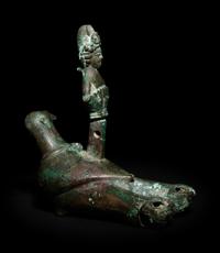 A Roman Bronze Oil Lamp in the Shape of a Dove with the Bust of a Goddess