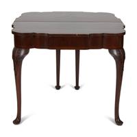 A Queen Anne Style Mahogany Flip Top Table