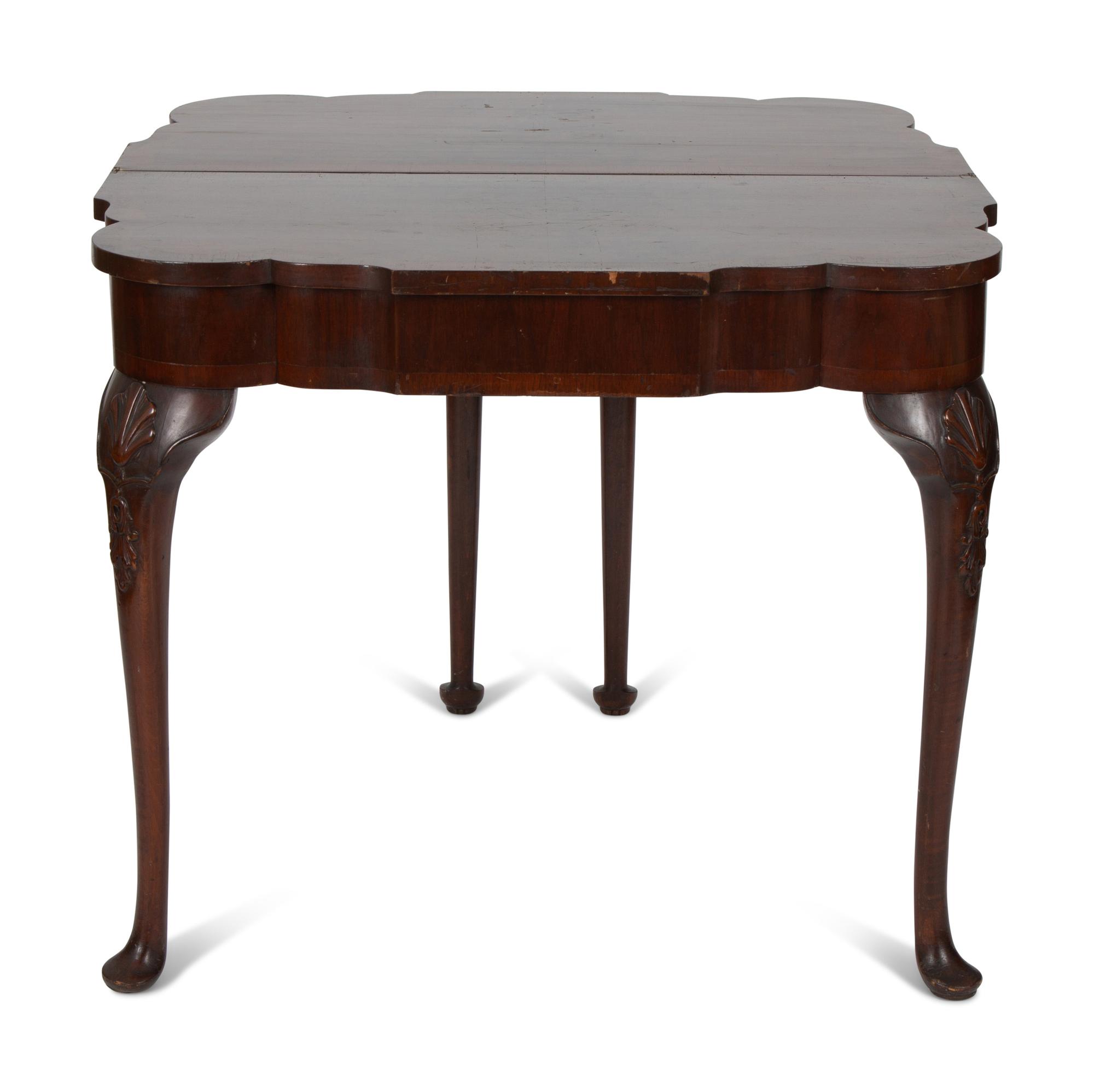 A Queen Anne Style Mahogany Flip Top Table