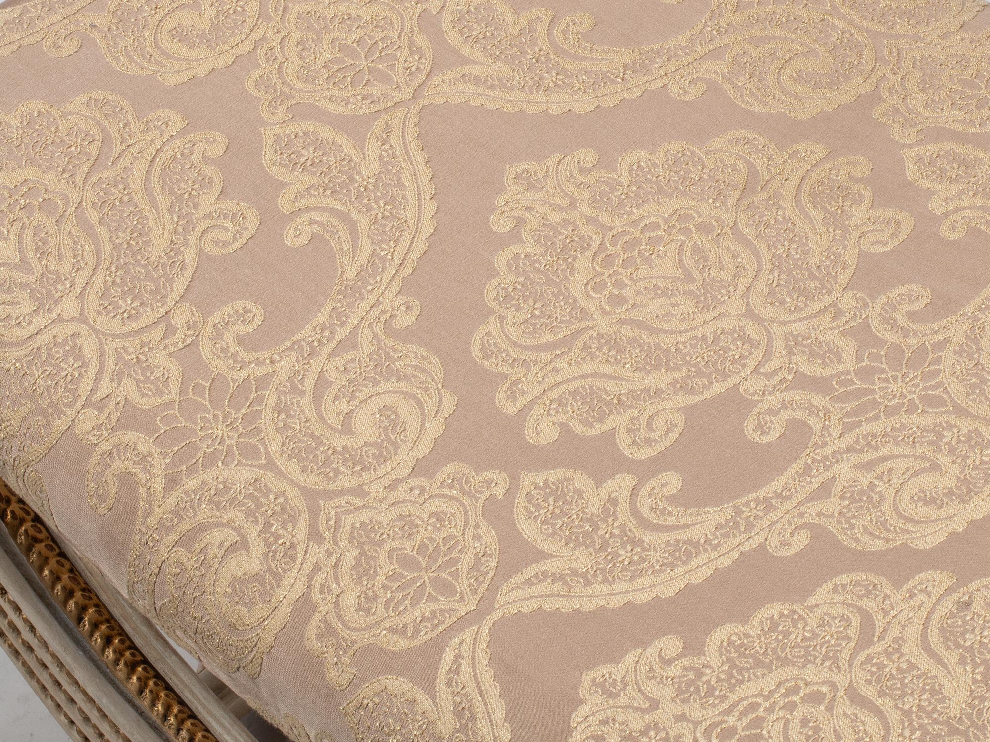 A Pair of Continental Painted and Parcel Gilt Curule-Form Tabourets