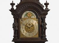 An impressive Renaissance Revival carved oak tall case clock, the case attributed to R.J. Horner & Co., New York, NY, with works by Winterhalder & Hofmeier, Schwaerzenbach, Black Forest, Germany, retailed by Tilden Thurber Co., Providence, RI, late 19th / early 20th century