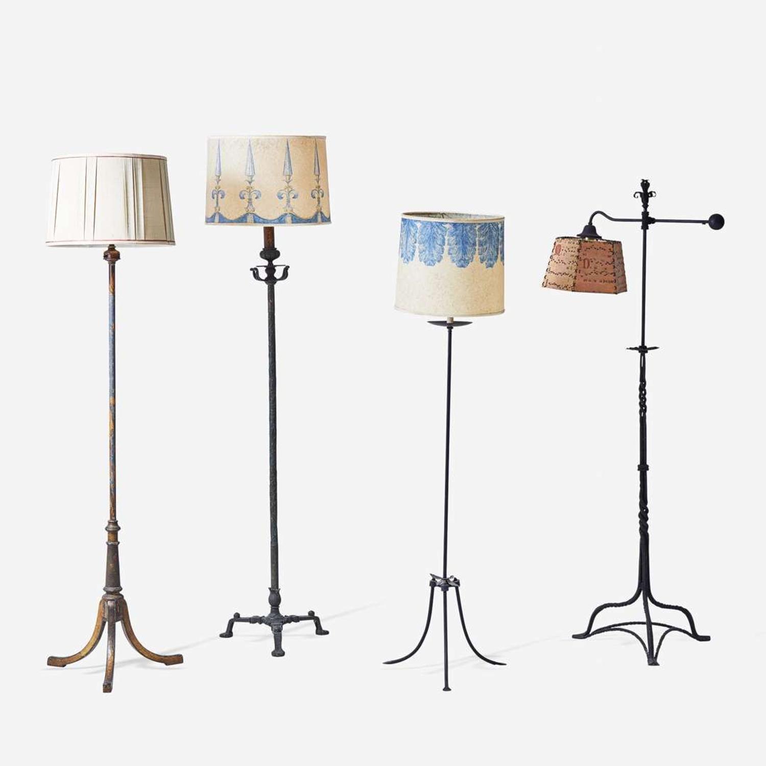 A group of four Gothic Revival iron and painted metal floor lamps early 20th century