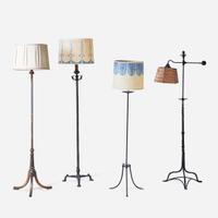 A group of four Gothic Revival iron and painted metal floor lamps early 20th century