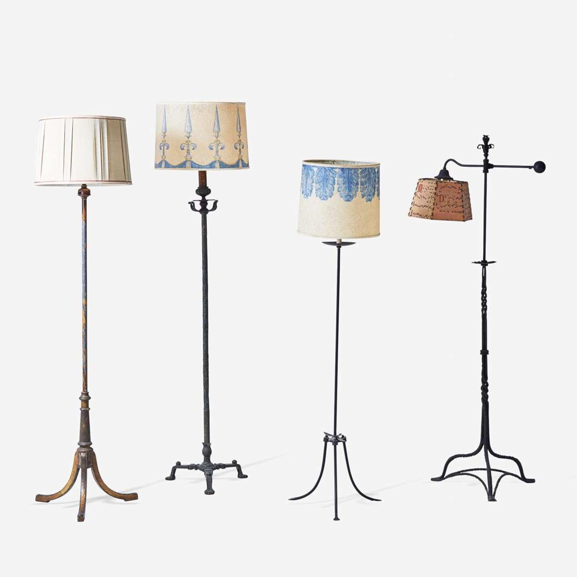 A group of four Gothic Revival iron and painted metal floor lamps early 20th century