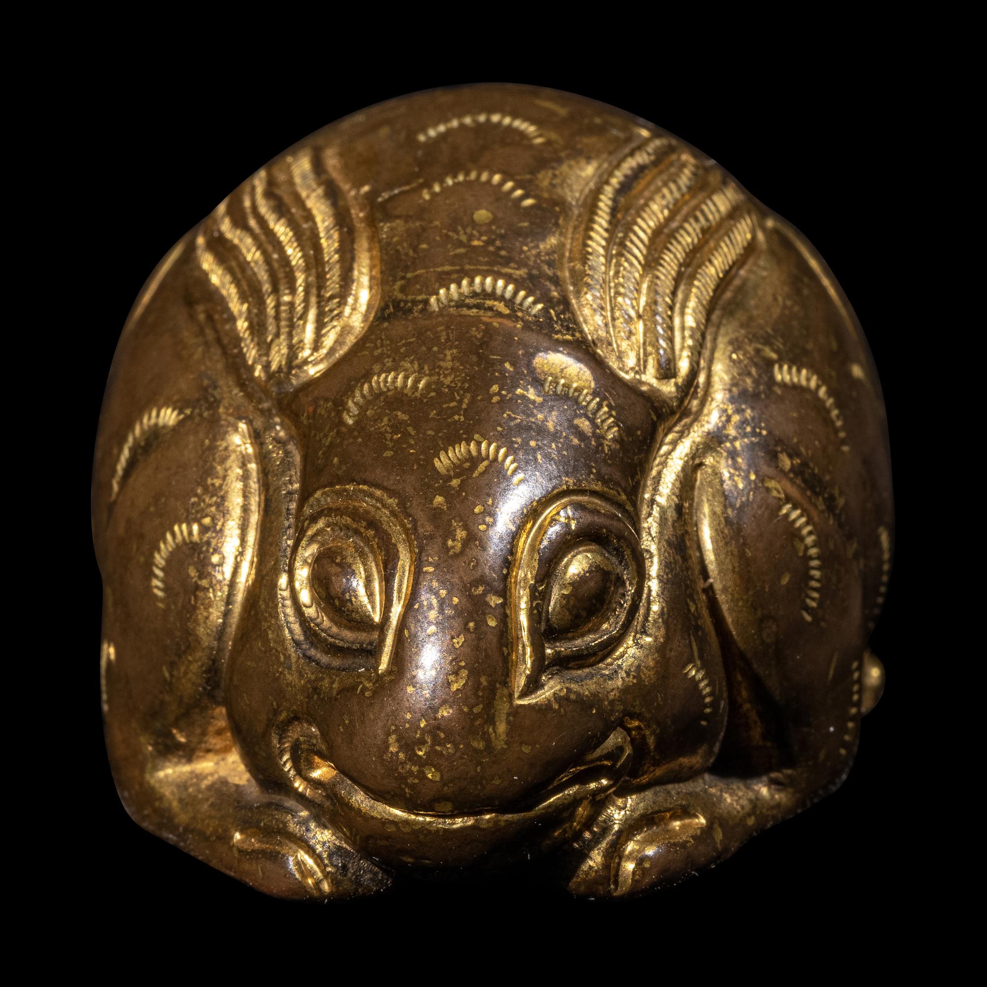 A Chinese Parcel Gilt Bronze Rabbit-Form Paper Weight