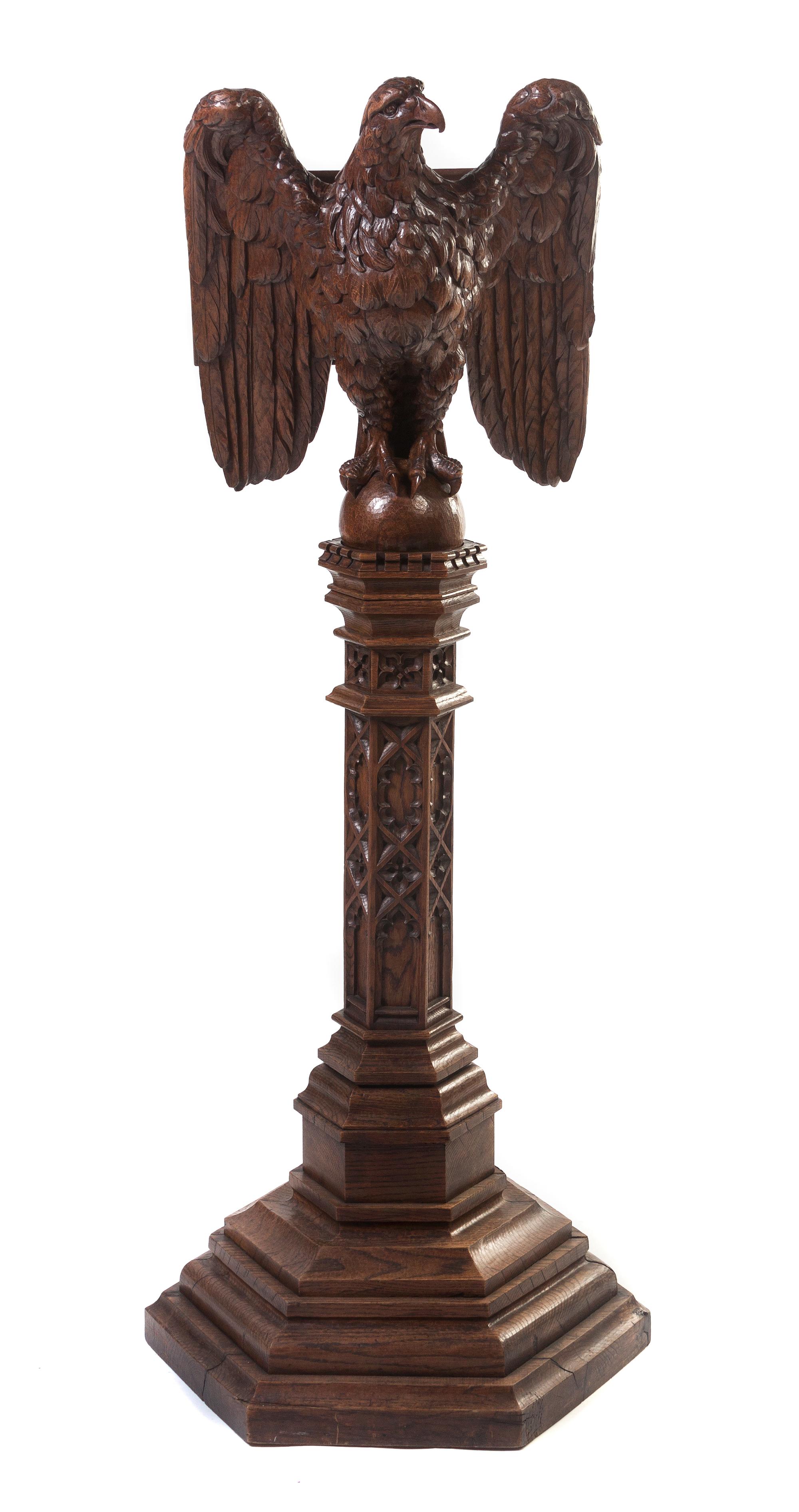 A Gothic Revival Oak Figural Lectern, Height 67 1/2 inches.