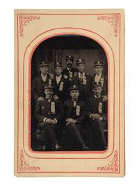 [EARLY PHOTOGRAPHY]. A group of 2 occupational photographs, incl. cabinet card of telephone switchboard operator and possible group of railroad police.