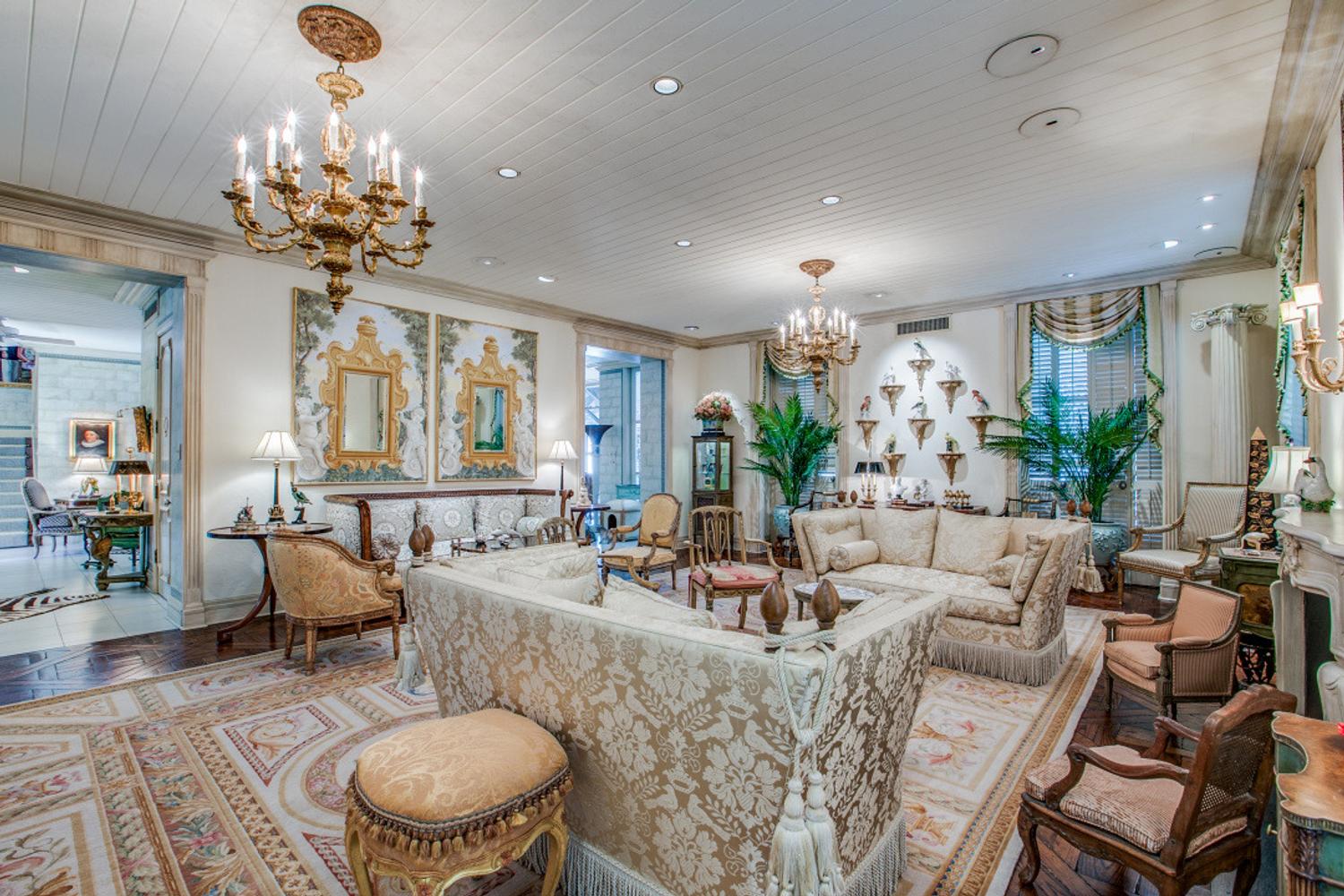 A French Gilt Bronze and Parcel Ebonized Burlwood Encrier