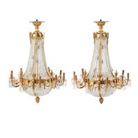 A Pair of French Neoclassical Style Gilt Bronze and Cut Glass Ten-Light Chandeliers