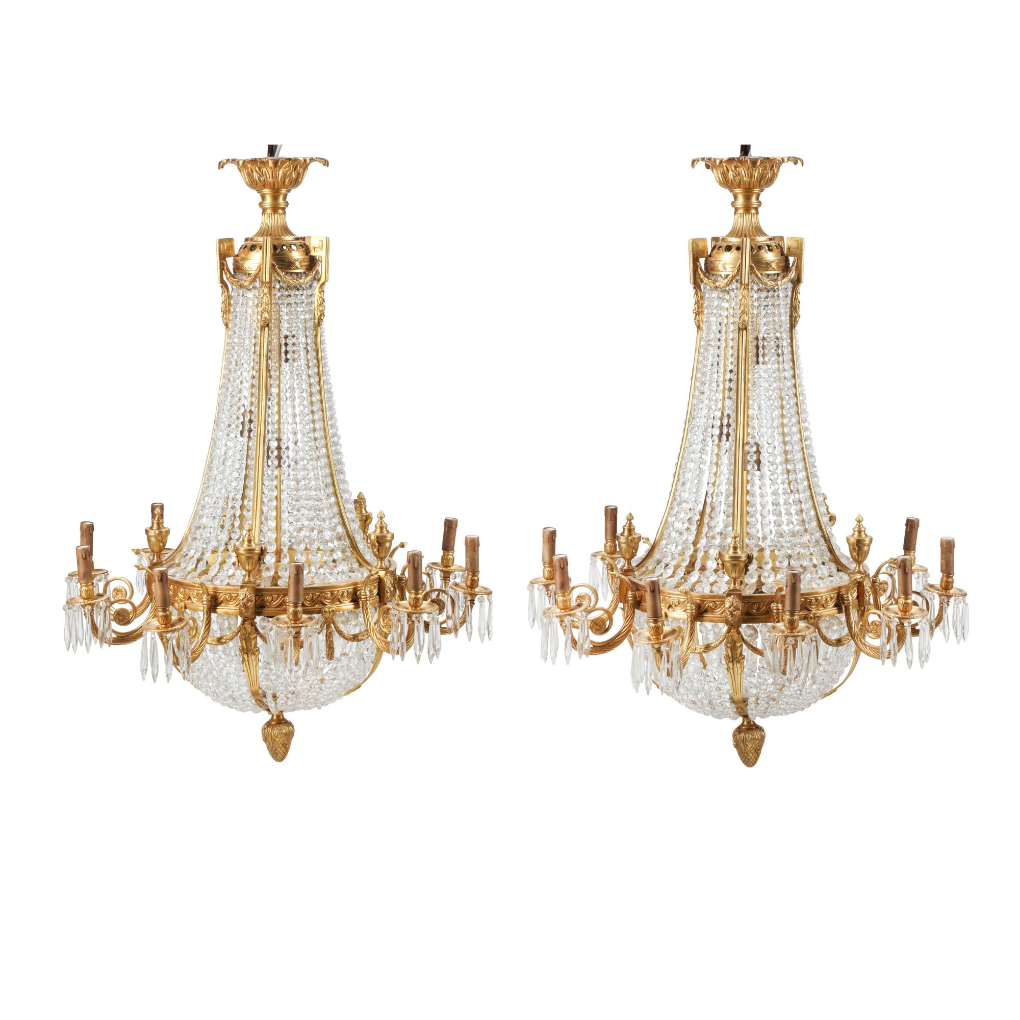 A Pair of French Neoclassical Style Gilt Bronze and Cut Glass Ten-Light Chandeliers