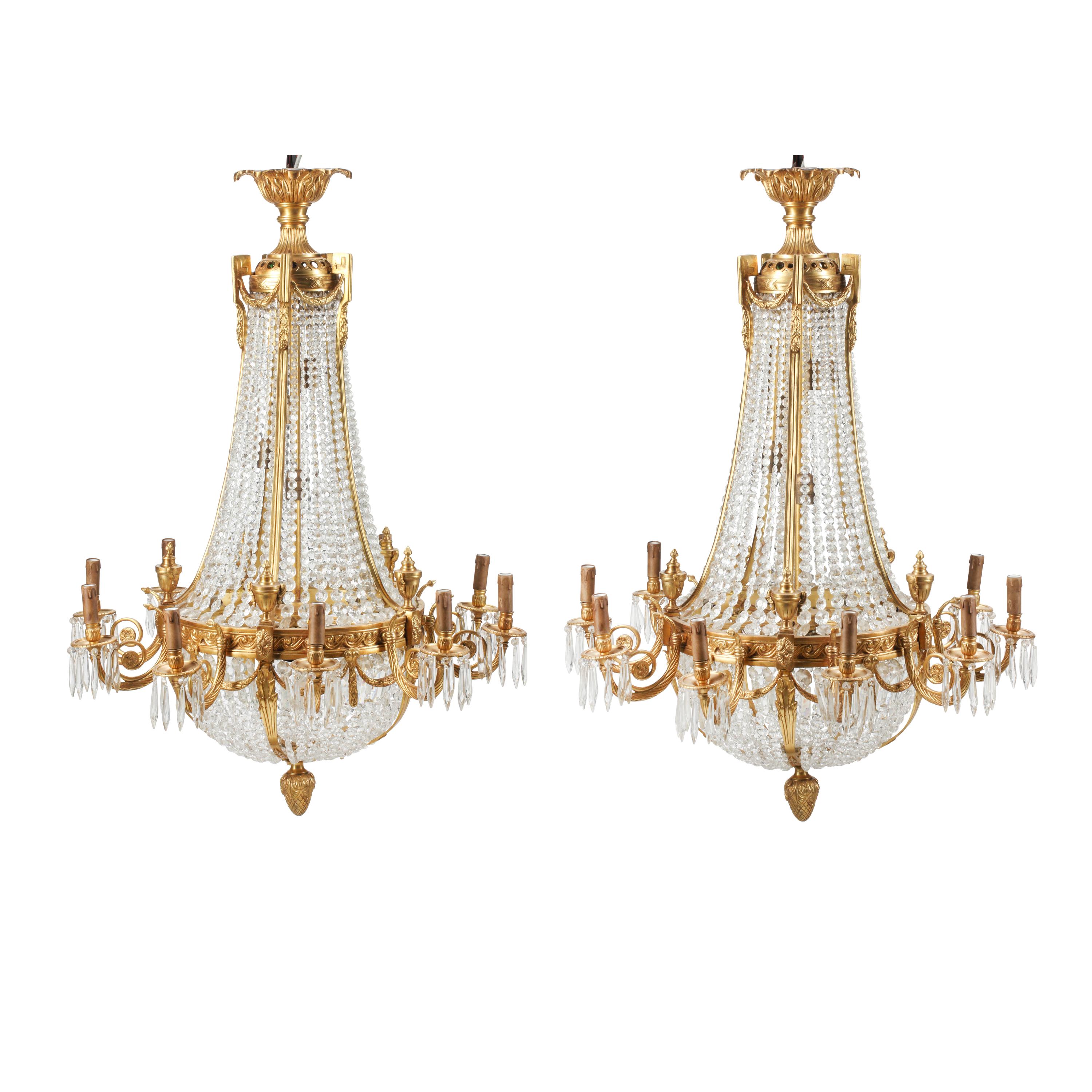 A Pair of French Neoclassical Style Gilt Bronze and Cut Glass Ten-Light Chandeliers