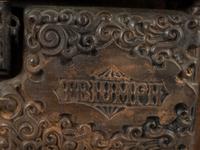 A 'Triumph' Range Salesman's Sample or Child's Toy Cast Iron Stove