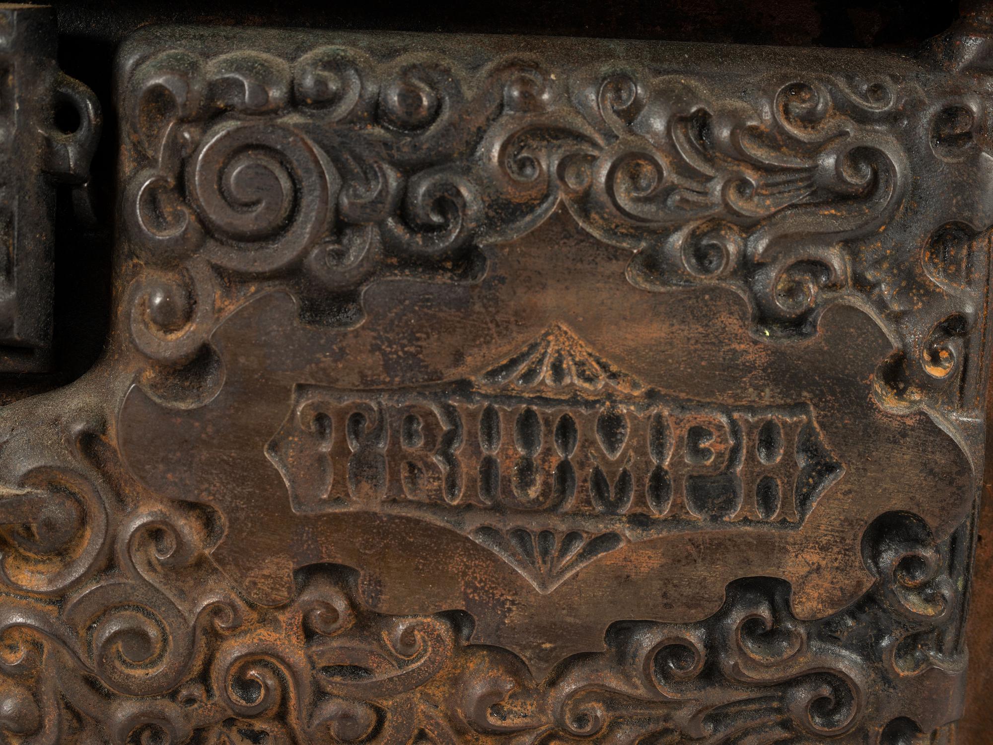 A 'Triumph' Range Salesman's Sample or Child's Toy Cast Iron Stove