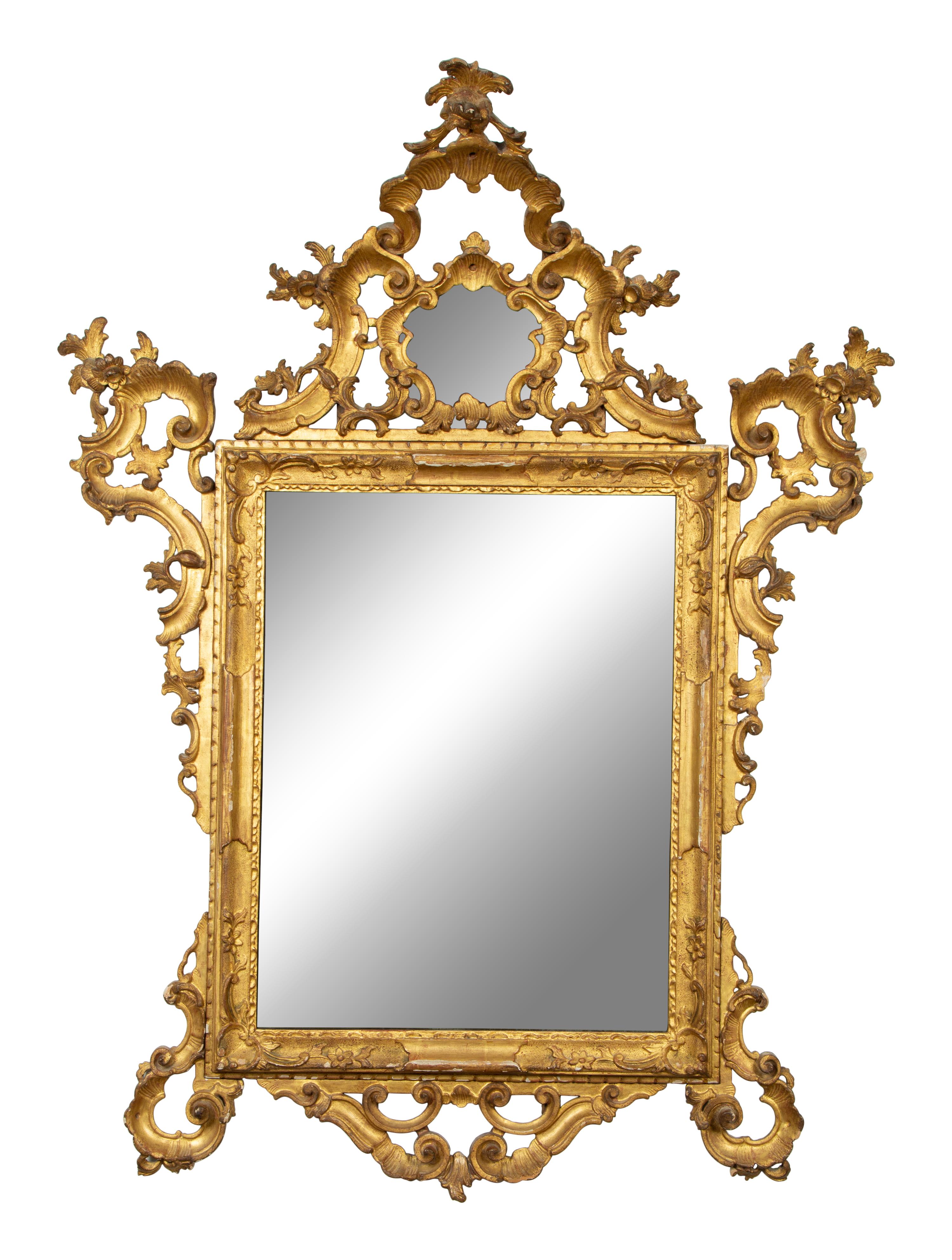 An Italian Rococo Carved Giltwood Mirror — 18TH CENTURY
